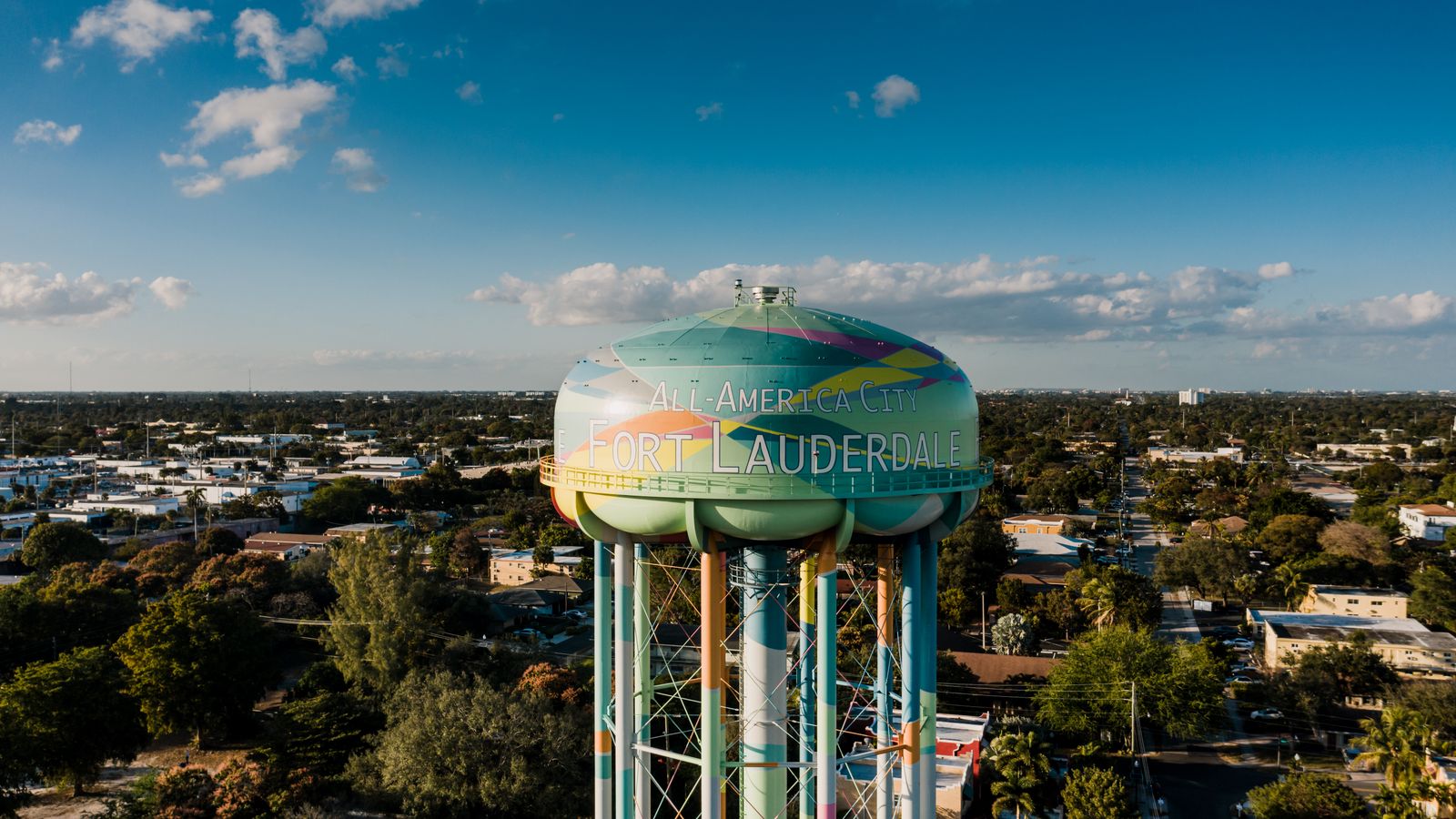 Aerial view of a Broward neighborhood and water tower